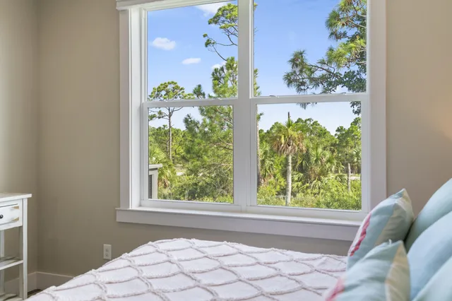 a view of a kitchen with a sink and cabinets