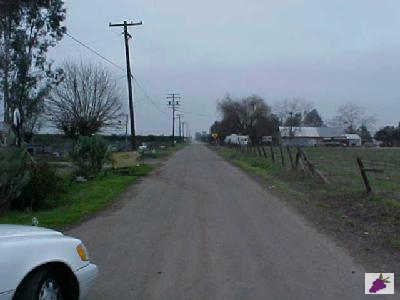 20147 East Goodfellow Avenue Reedley, CA 93654 - Photo 14 of 16 street scene looking west