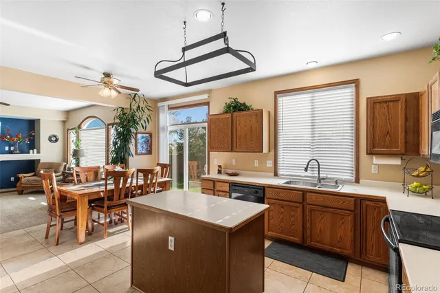 a view of a kitchen area with furniture and window