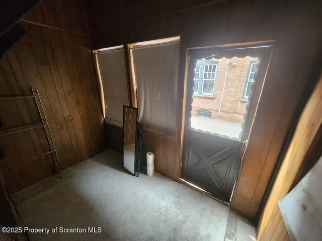 a view of street with parked cars