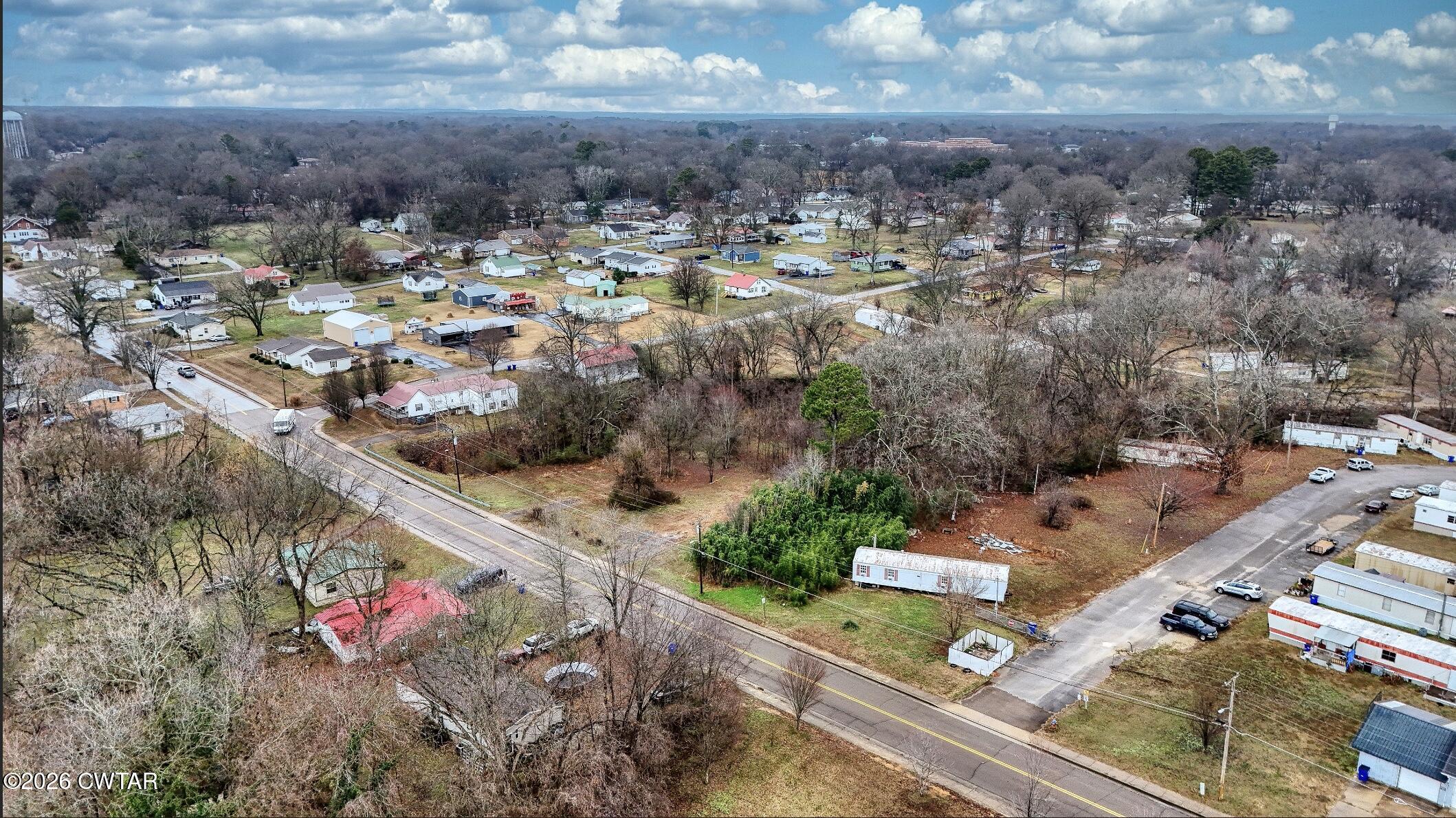 641 Forrest Avenue McKenzie, TN 38201 - Photo 5 of 11 an aerial view of residential houses with outdoor space