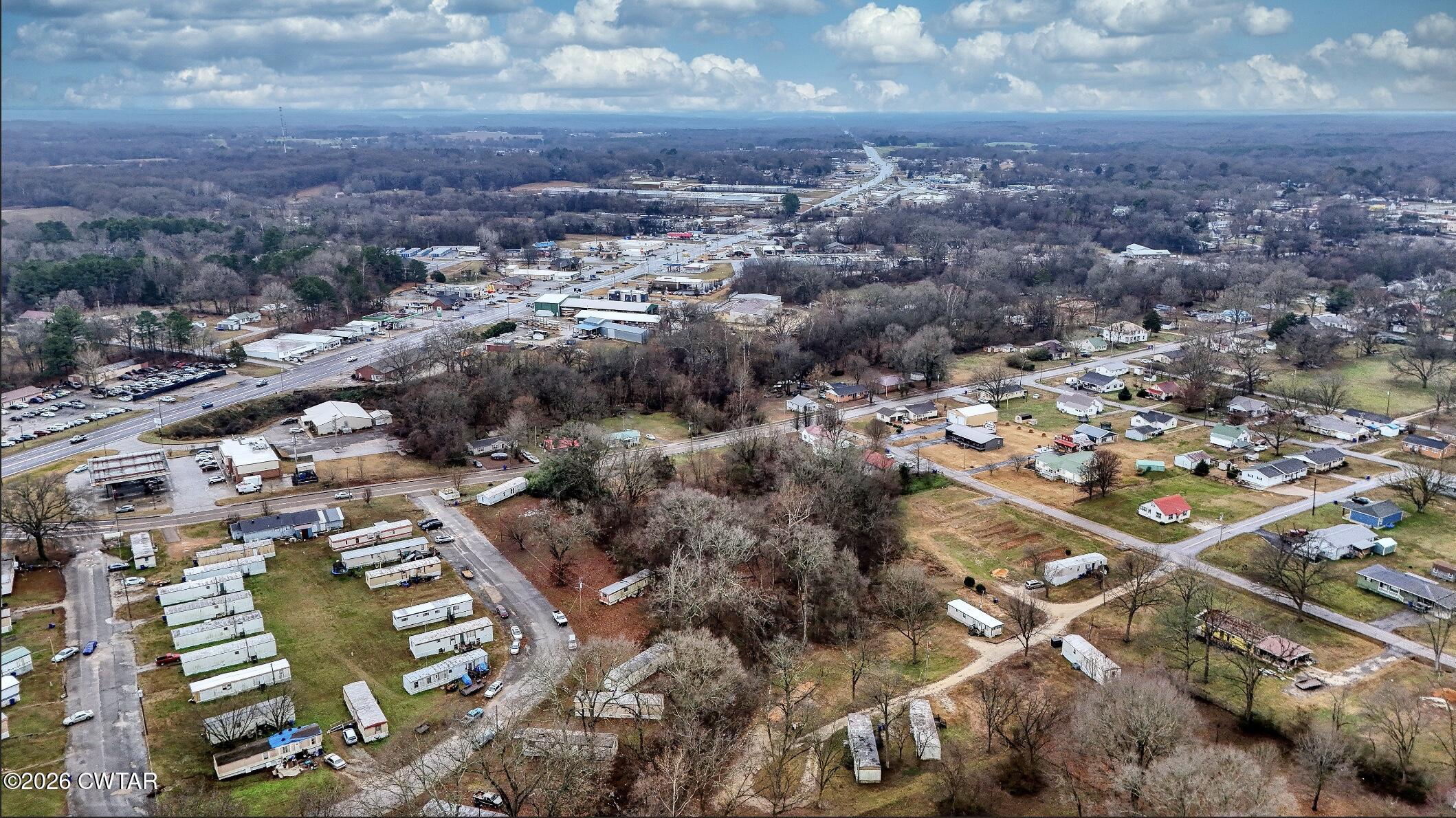 641 Forrest Avenue McKenzie, TN 38201 - Photo 6 of 11 an aerial view of residential houses with city view