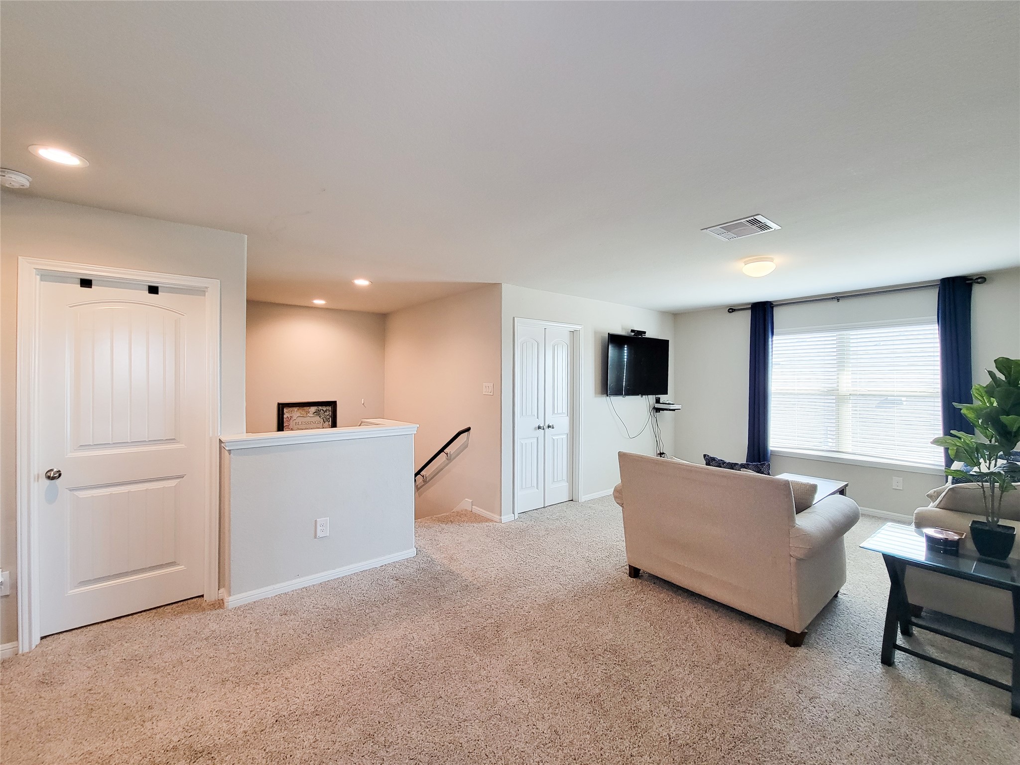 8003 Ecru Lane Rosharon, TX 77583 - Photo 25 of 43 a living room with furniture and a flat screen tv