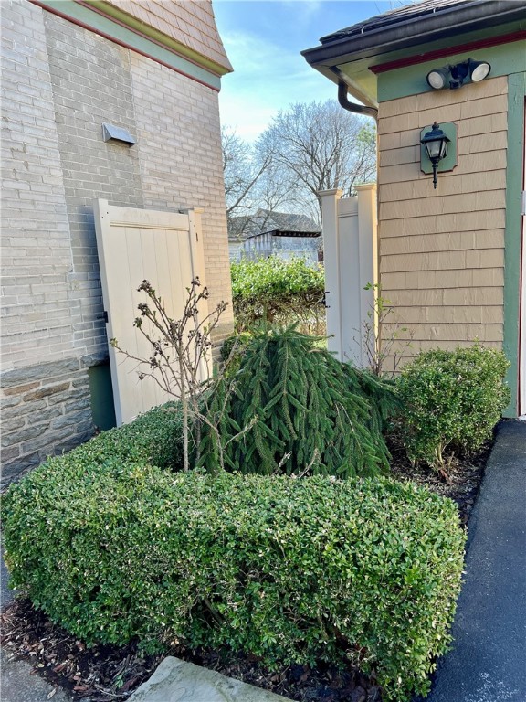 50 Center Street Oneonta, NY 13820 - Photo 36 of 48 Privacy gate opens to cozy back yard.