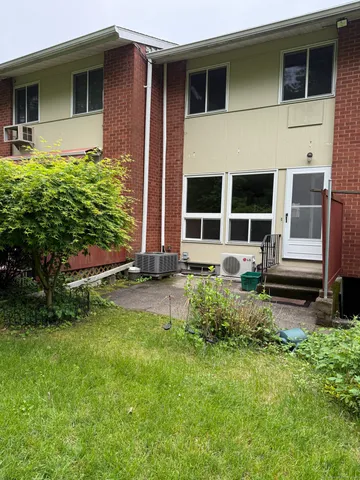 a house with garden in front of it