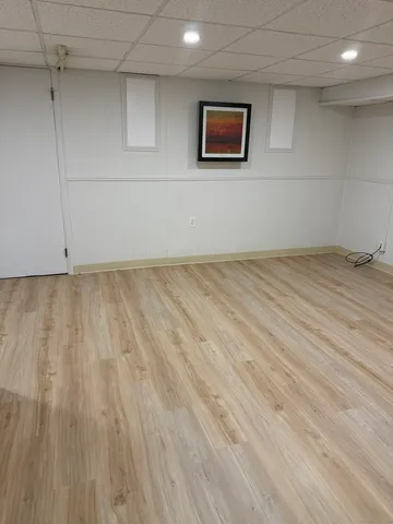 a view of a livingroom with wooden floor