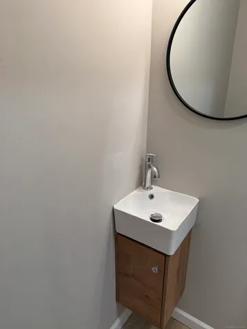 a sink with a mirror