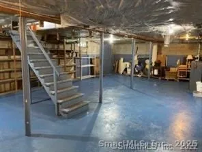 a view of a garage with parked cars