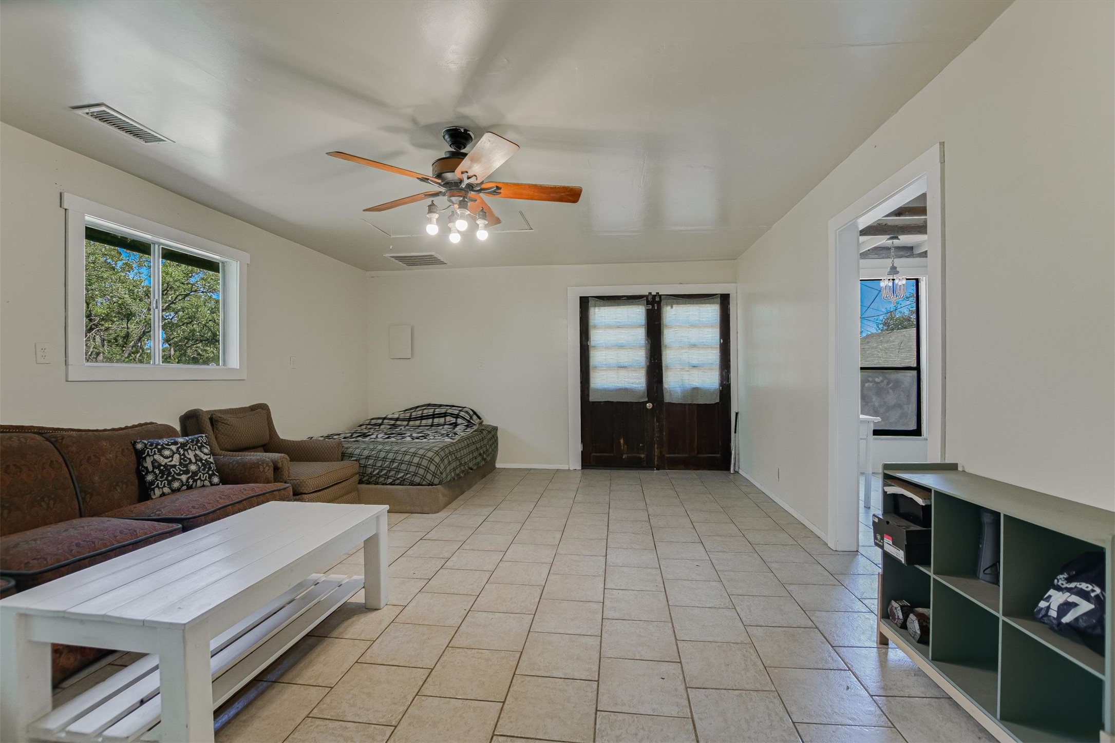 12711 Rr, Unit 12 Wimberley, TX 78676 - Photo 13 of 20 This secondary living room is a great spot for a home office, a rental guest space, or multigenerational living