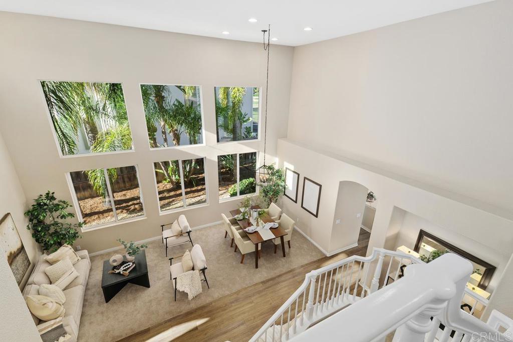 46056 Paseo Gallante Temecula, CA 92592 - Photo 20 of 41 a living room with furniture and large windows