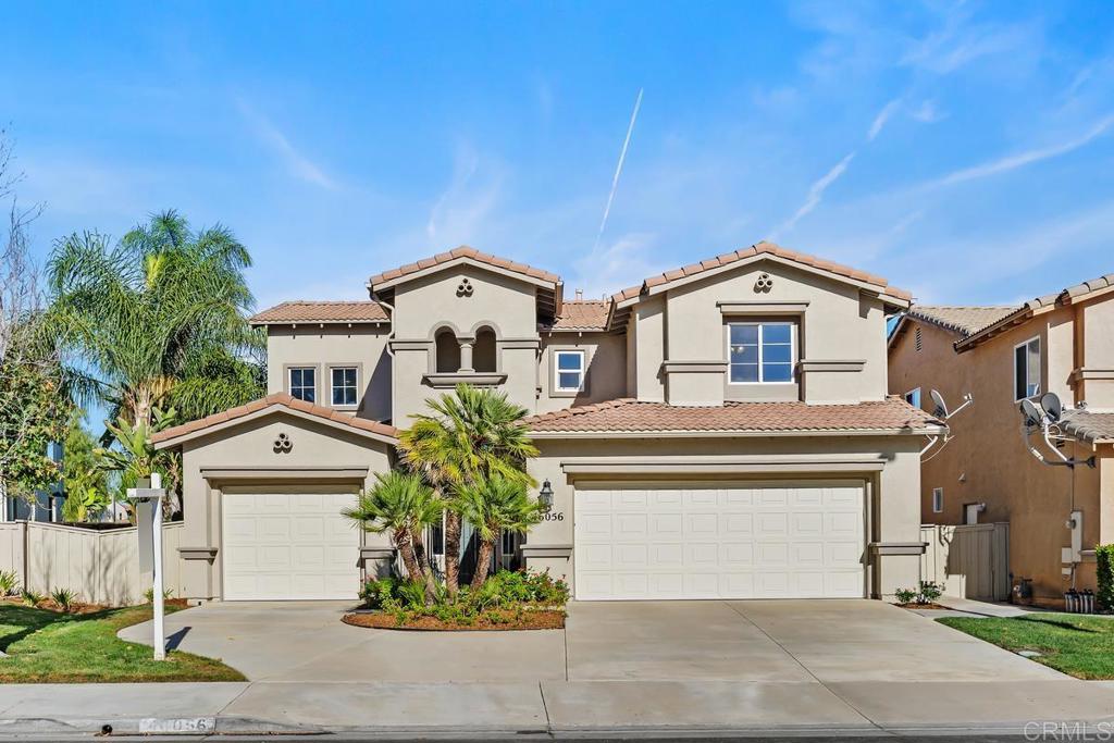 46056 Paseo Gallante Temecula, CA 92592 - Photo 2 of 41 a front view of a house with a yard