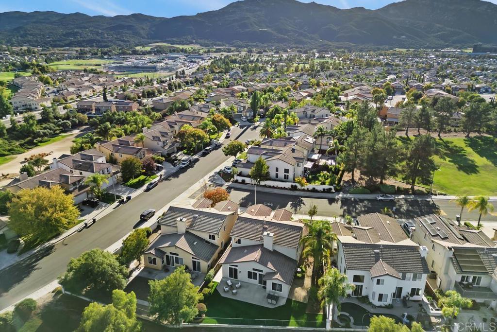 46056 Paseo Gallante Temecula, CA 92592 - Photo 37 of 41 an aerial view of residential building and lake