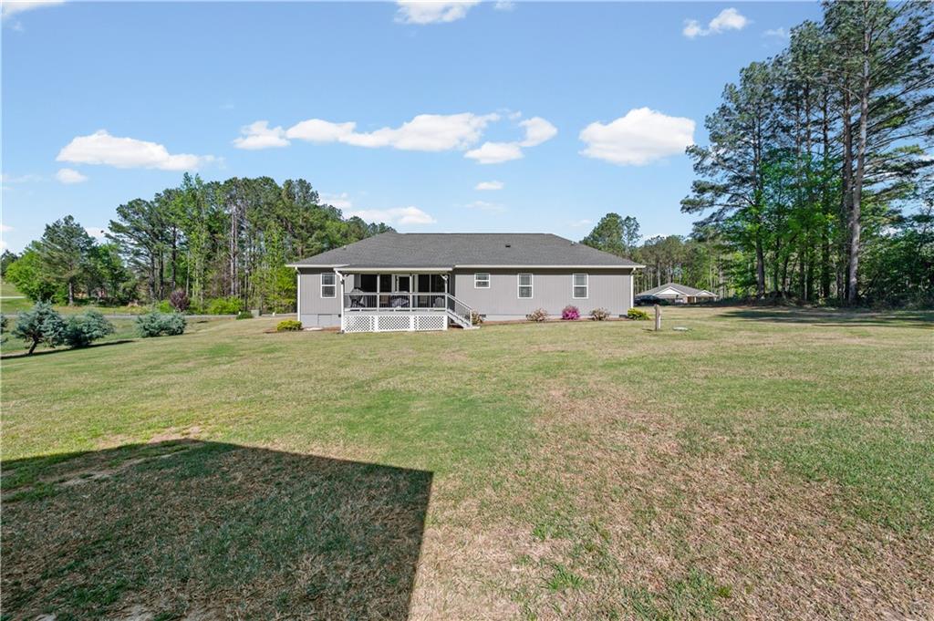 611 Bell Loop Chatsworth, GA 30705 - Photo 36 of 42 a view of a house with yard and sitting area