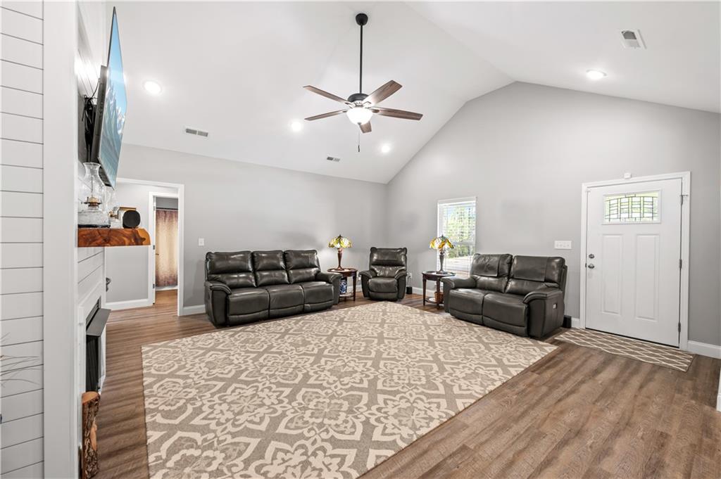 611 Bell Loop Chatsworth, GA 30705 - Photo 8 of 42 a living room with furniture and a flat screen tv