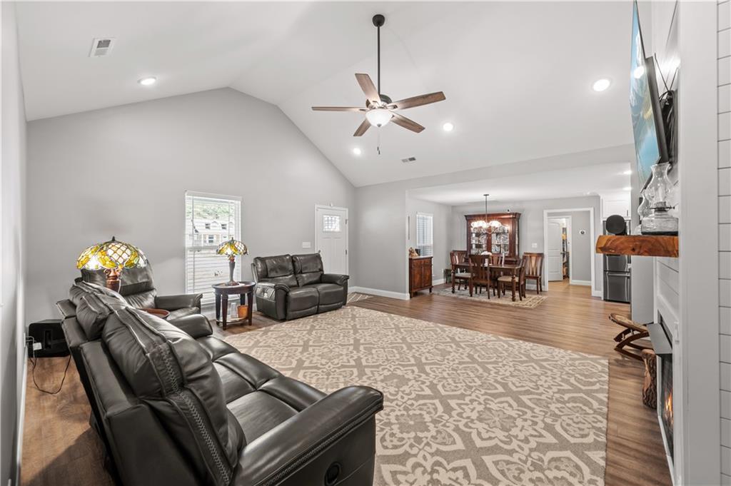 611 Bell Loop Chatsworth, GA 30705 - Photo 9 of 42 a living room with furniture and a chandelier