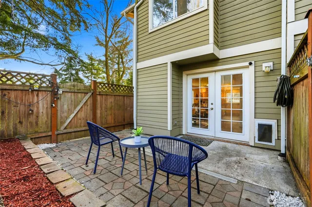 a backyard of a house with seating space