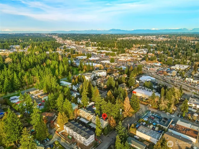 an aerial view of residential building with parking space