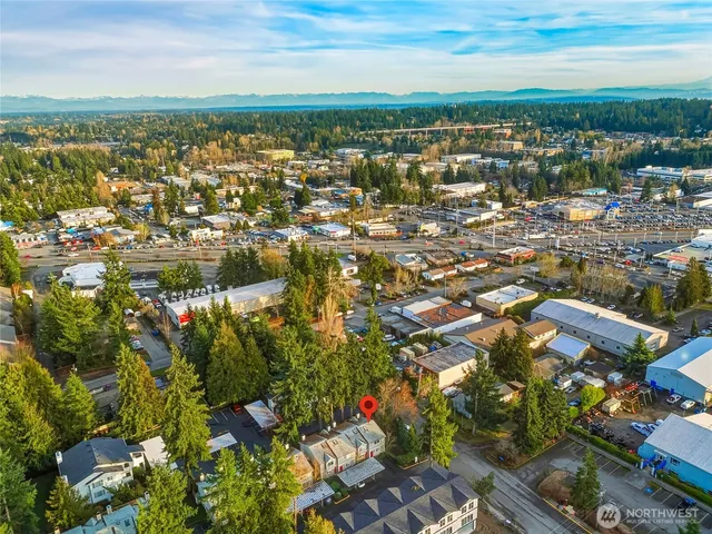 an aerial view of residential building with parking space