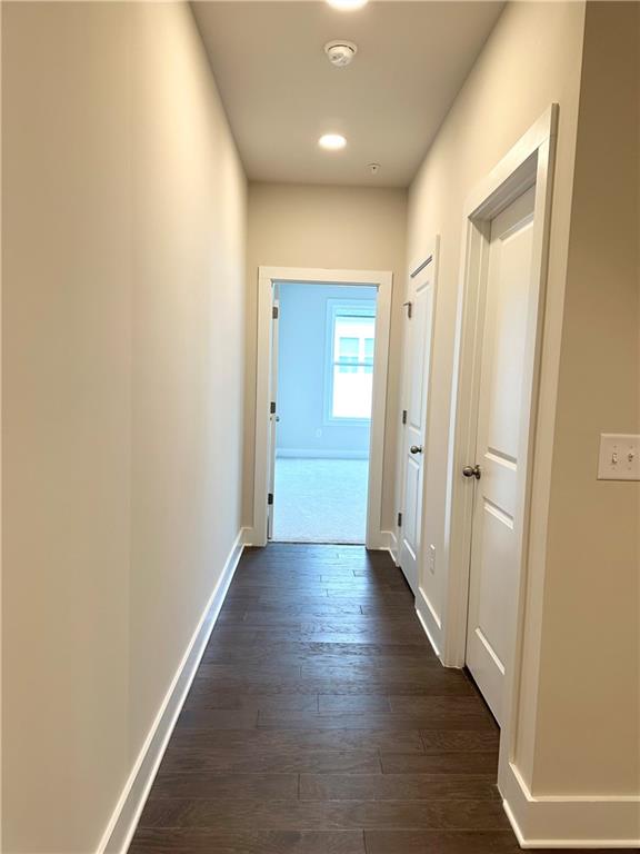 1237 Waldon Crossing Cumming, GA 30041 - Photo 10 of 29 a view of a hallway with wooden floor