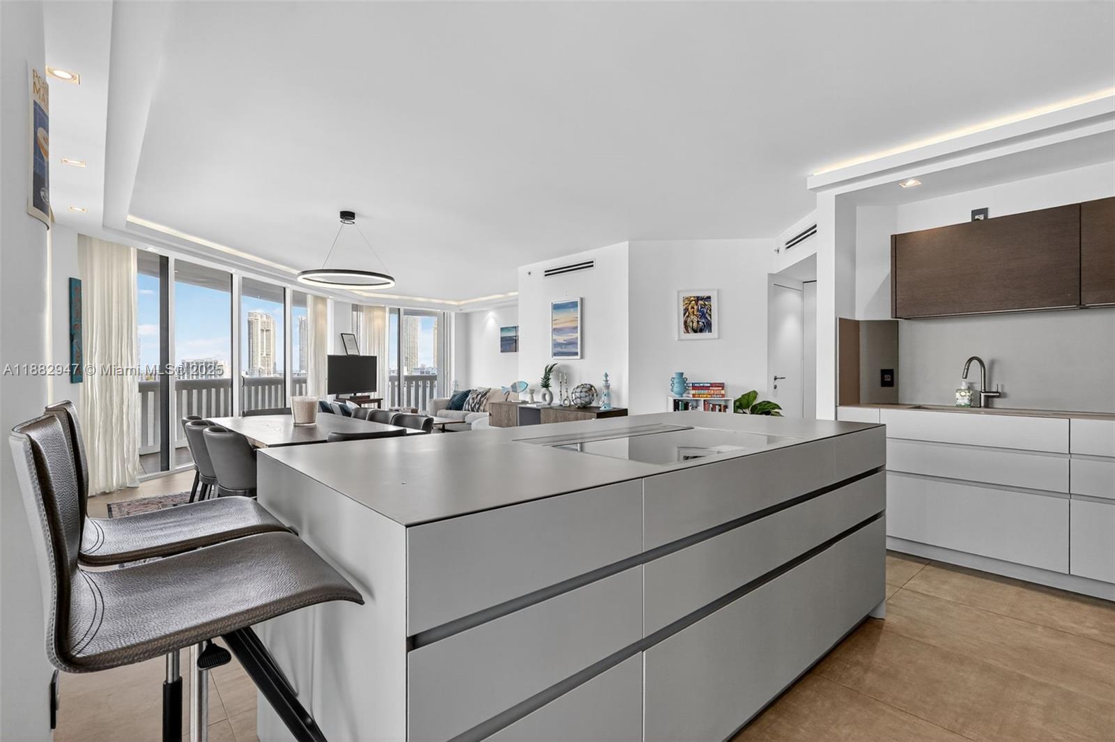 3000 Island Boulevard, Unit 906 Aventura, FL 33160 - Photo 13 of 58 a view of living room with furniture and flat screen tv