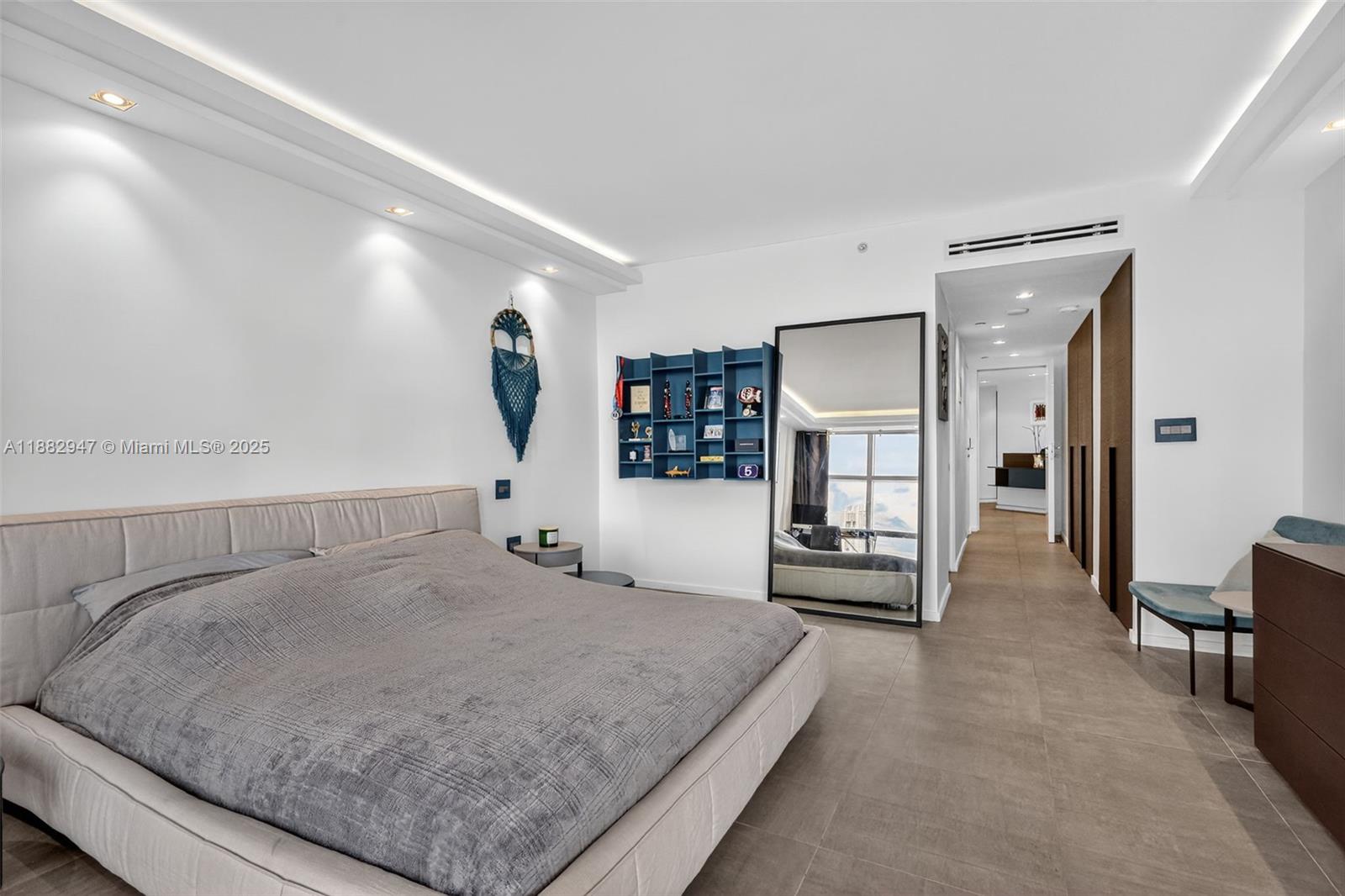 3000 Island Boulevard, Unit 906 Aventura, FL 33160 - Photo 25 of 58 a view of a livingroom with a staircase