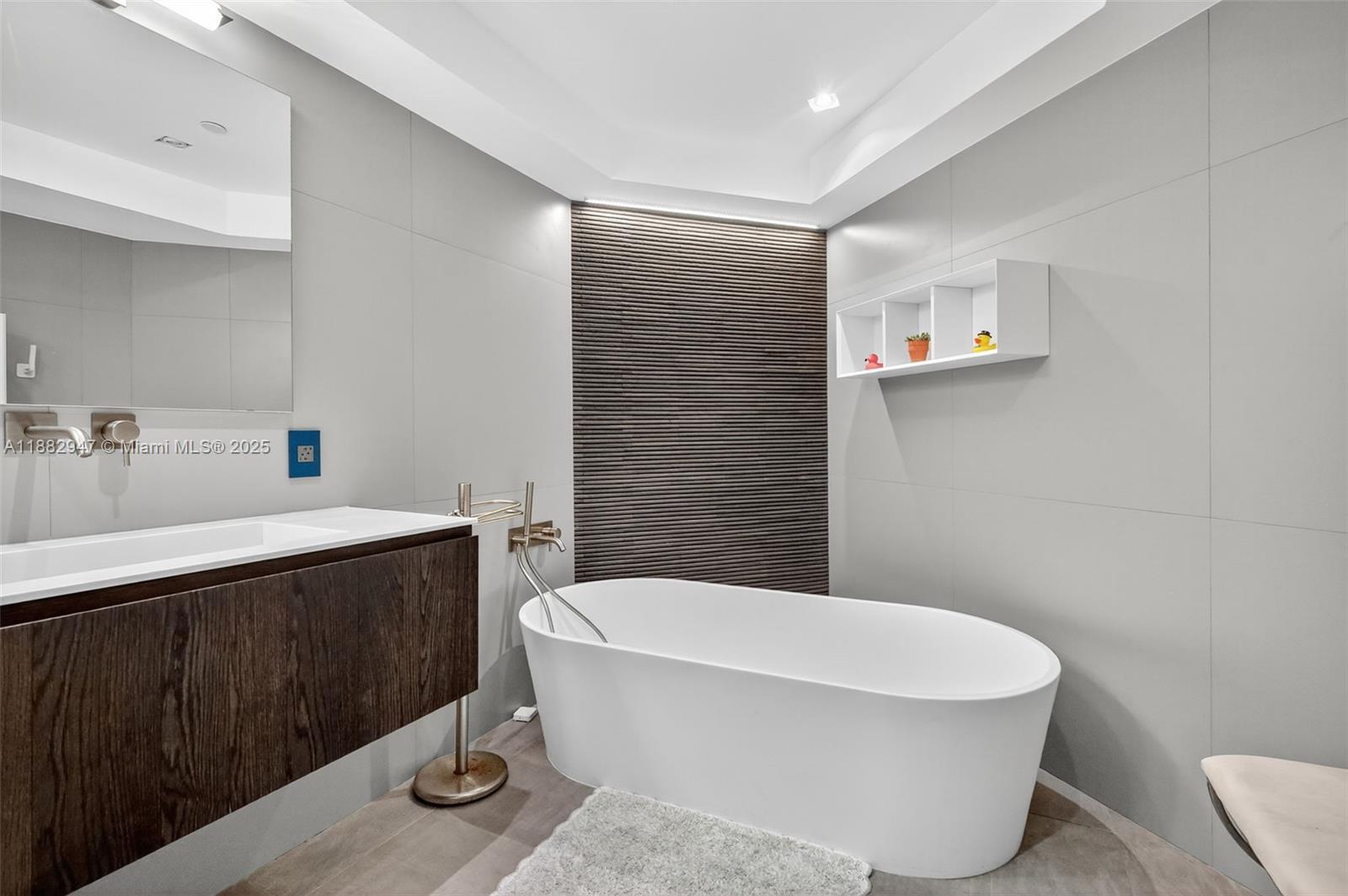 3000 Island Boulevard, Unit 906 Aventura, FL 33160 - Photo 30 of 58 a bathroom with a sink a toilet and shower