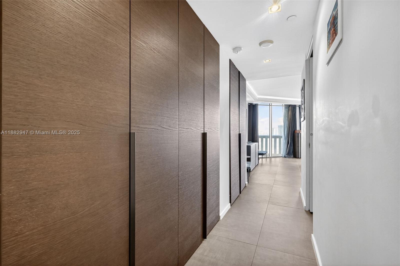 3000 Island Boulevard, Unit 906 Aventura, FL 33160 - Photo 34 of 58 a view of a hallway