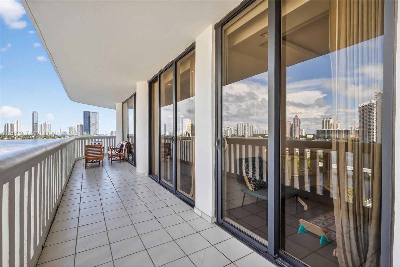 3000 Island Boulevard, Unit 906 Aventura, FL 33160 - Photo 47 of 58 a view of a city from a balcony