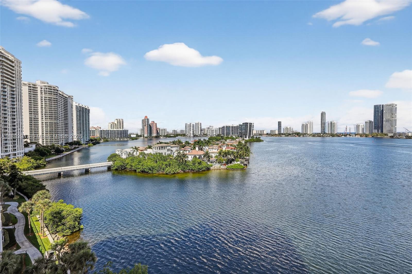3000 Island Boulevard, Unit 906 Aventura, FL 33160 - Photo 54 of 58 a view of a balcony with dining table and chairs