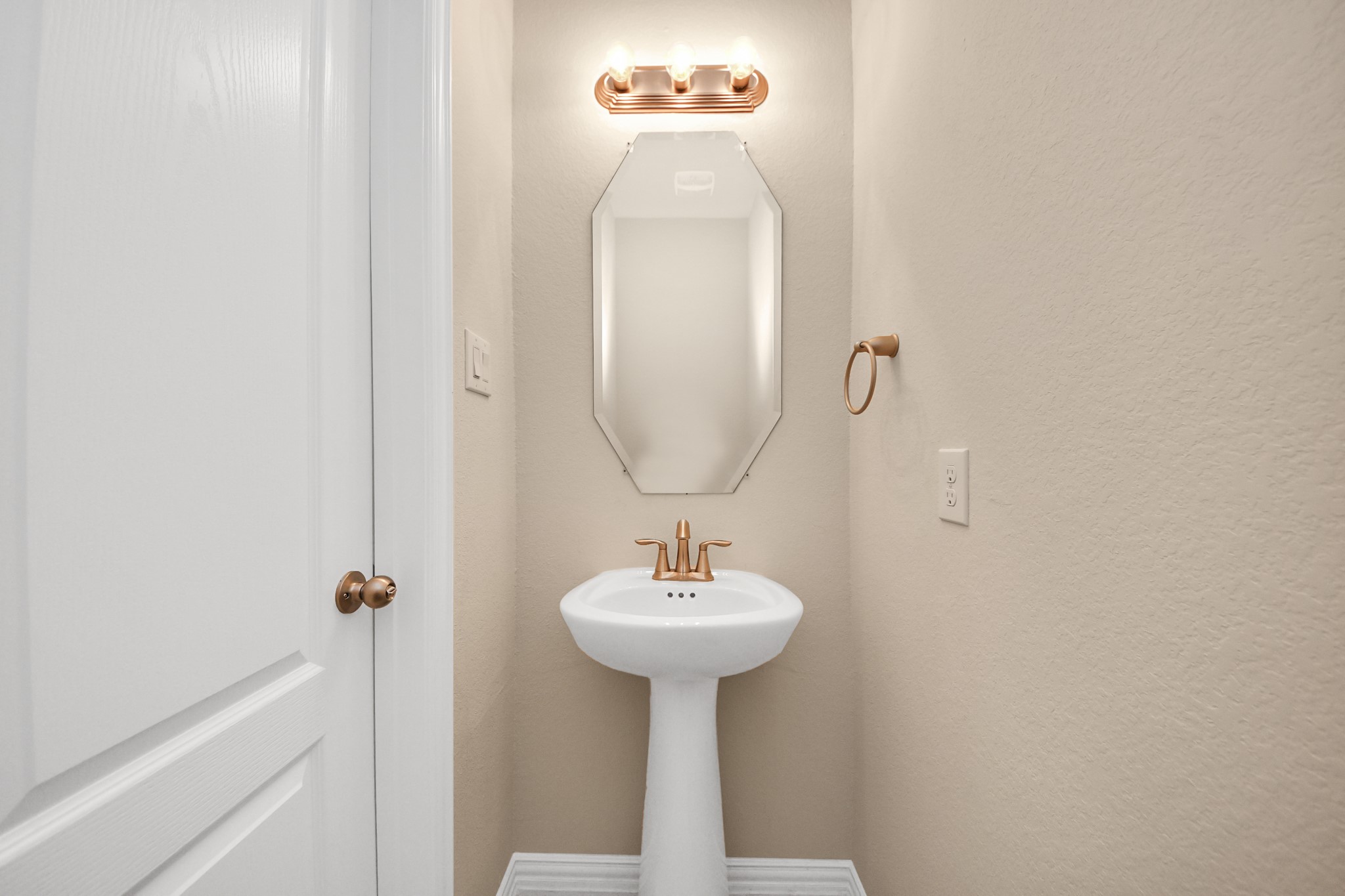 32903 Silver Meadow Way Brookshire, TX 77423 - Photo 16 of 40 a bathroom with a sink a mirror and a window