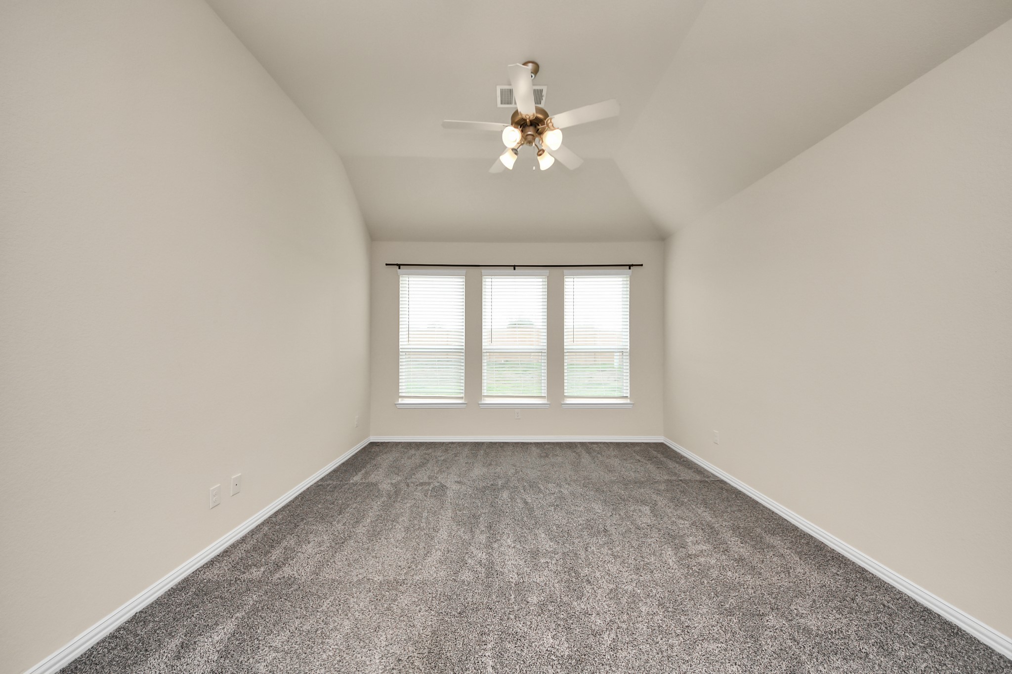 32903 Silver Meadow Way Brookshire, TX 77423 - Photo 19 of 40 an empty room with chandelier fan and windows
