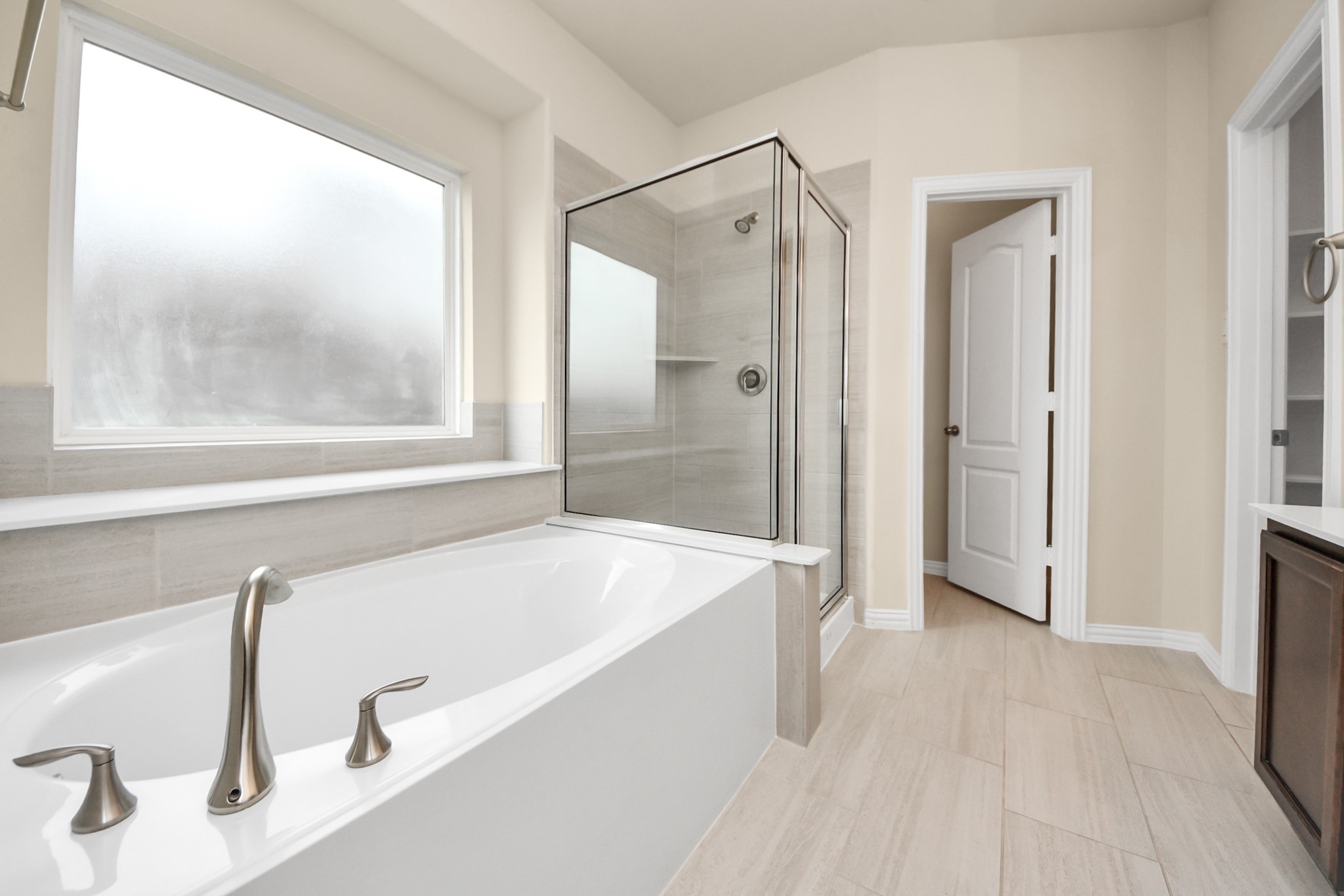 32903 Silver Meadow Way Brookshire, TX 77423 - Photo 20 of 40 a bathroom with a tub and a shower