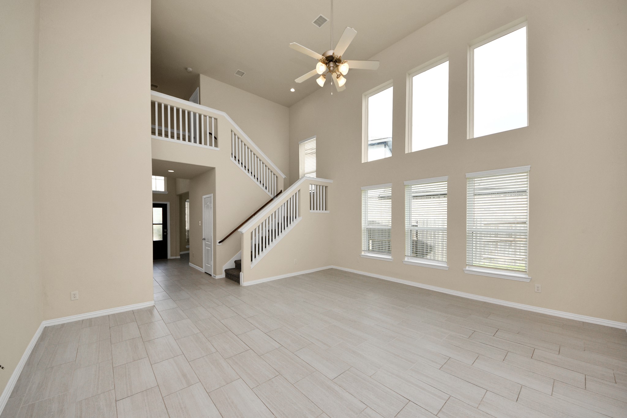 32903 Silver Meadow Way Brookshire, TX 77423 - Photo 24 of 40 an empty room with windows and ceiling fan