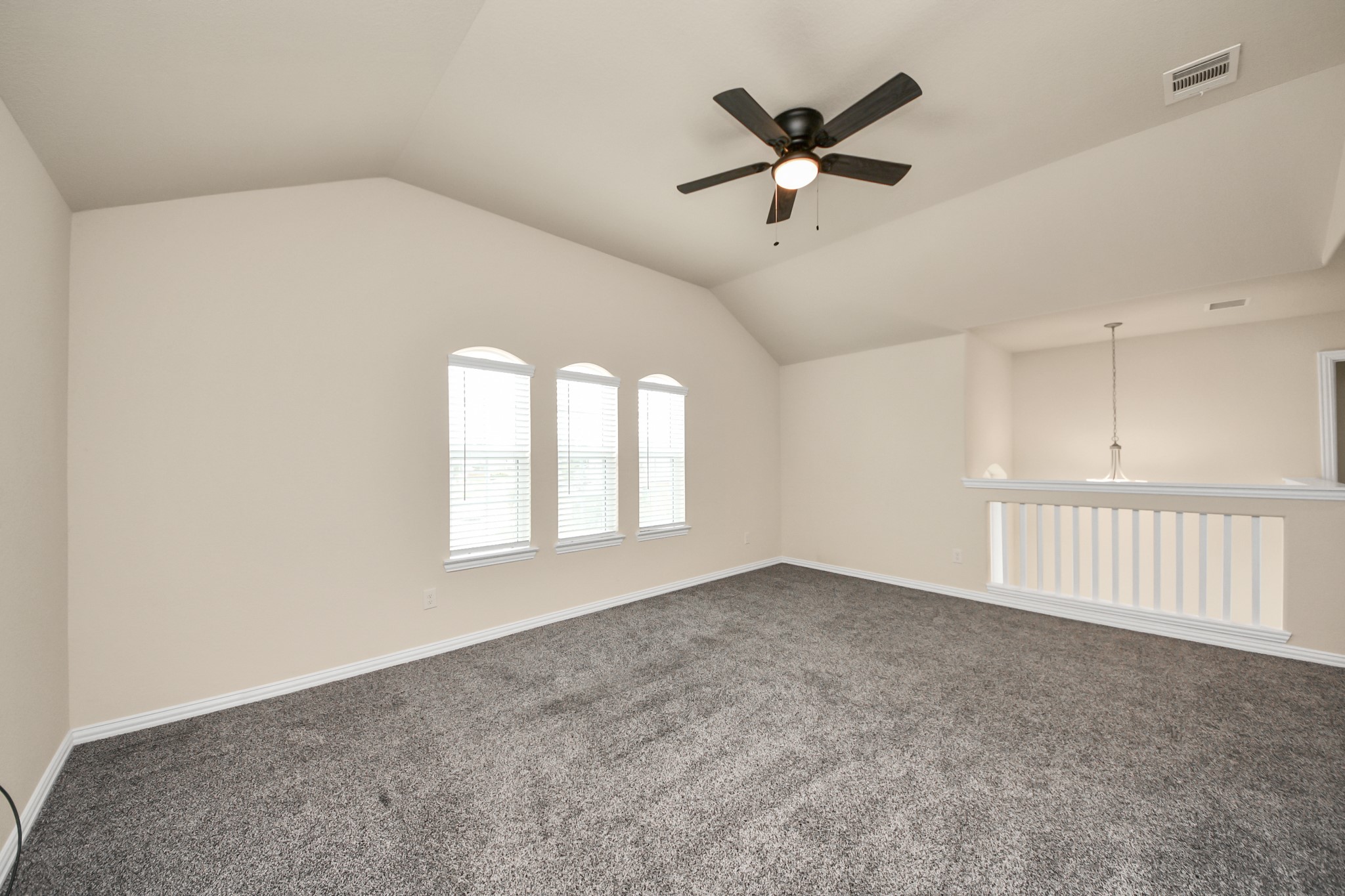 32903 Silver Meadow Way Brookshire, TX 77423 - Photo 28 of 40 an empty room with ceiling fan and windows
