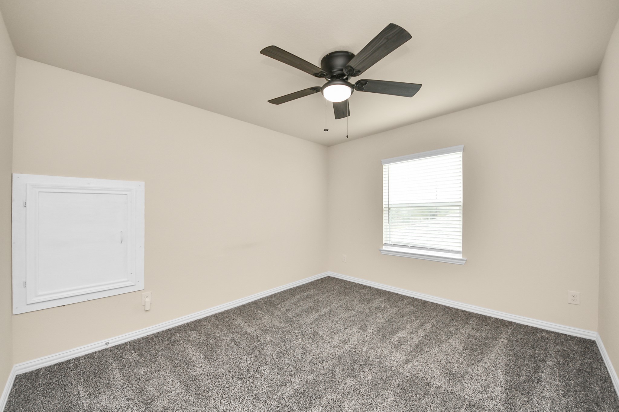 32903 Silver Meadow Way Brookshire, TX 77423 - Photo 31 of 40 an empty room with a window and a fan