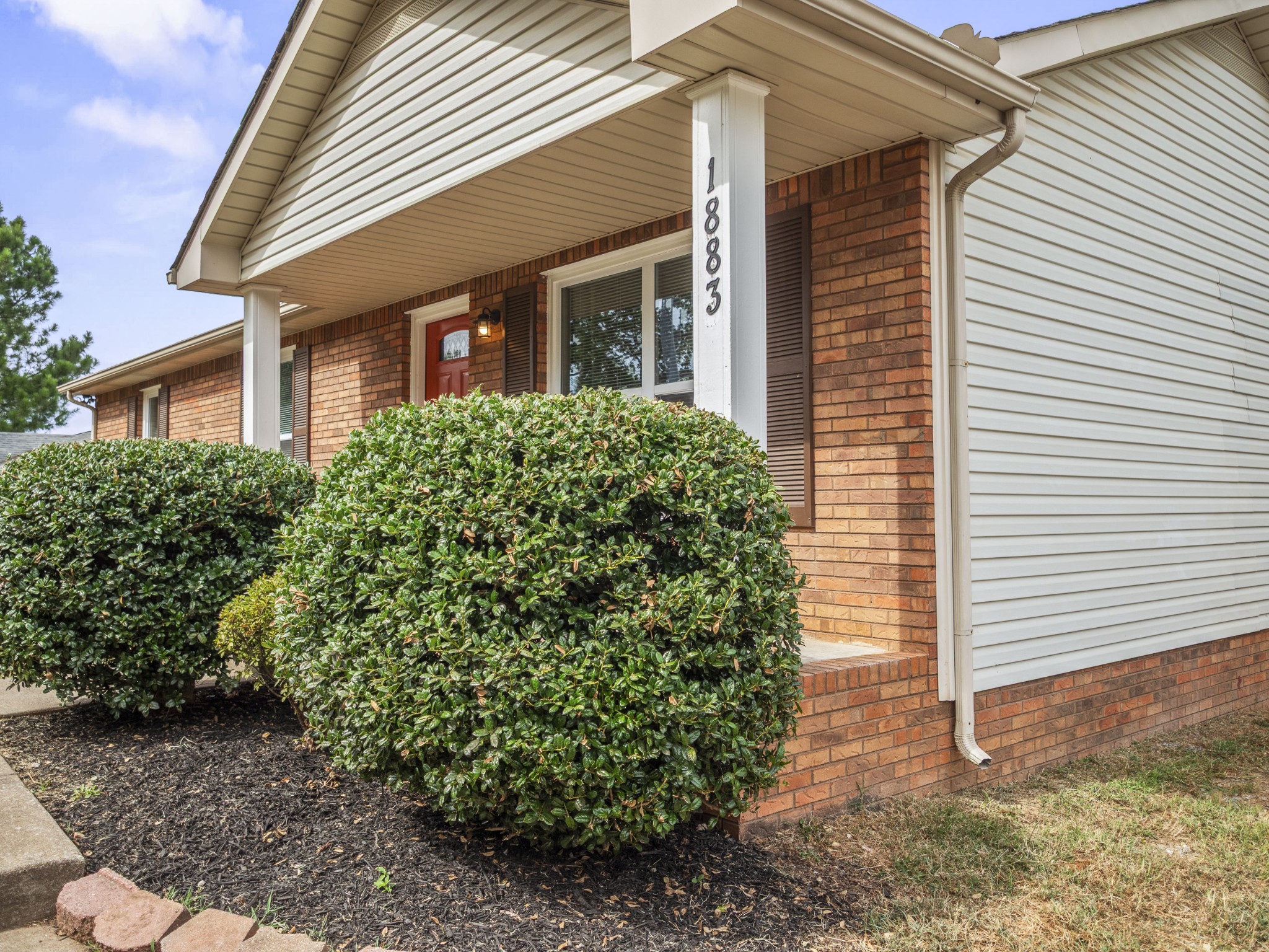 1883 Needmore Road Clarksville, TN 37042 - Photo 2 of 25 a front view of a house with garden