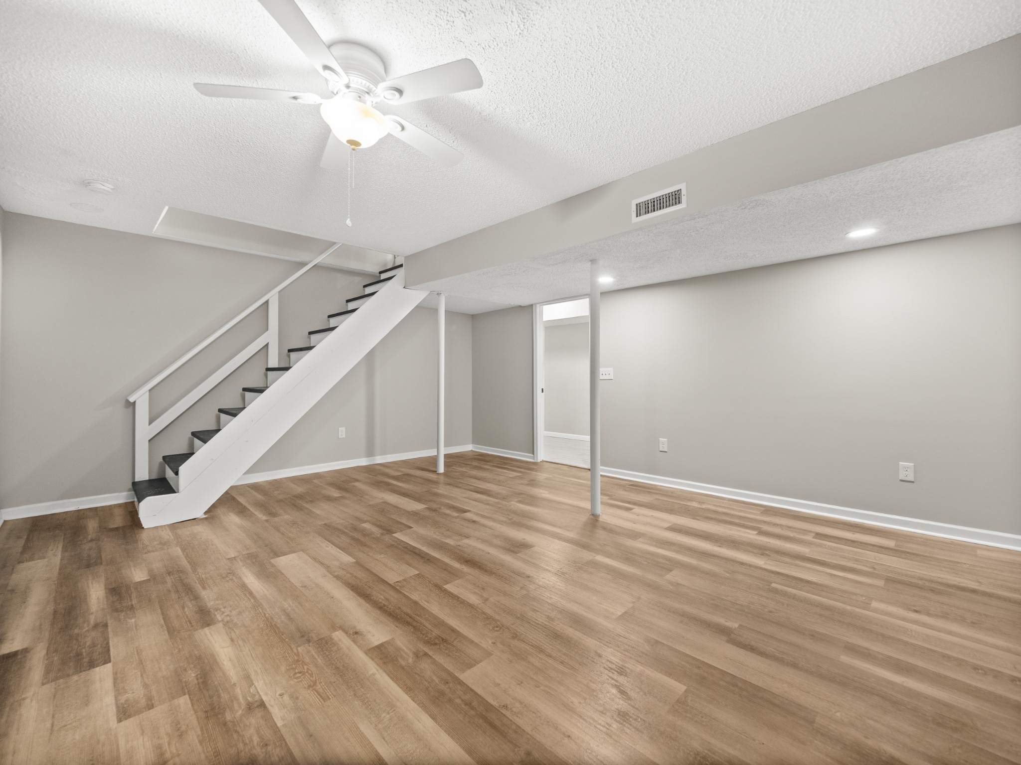 1883 Needmore Road Clarksville, TN 37042 - Photo 21 of 25 wooden floor in an empty room