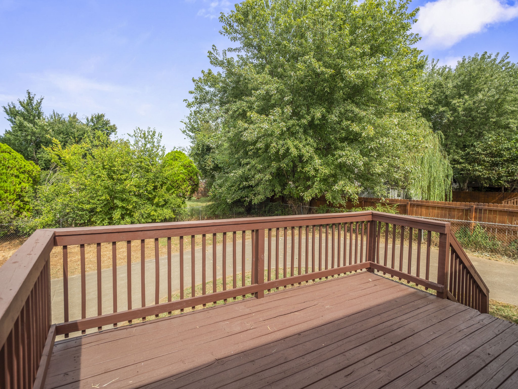 1883 Needmore Road Clarksville, TN 37042 - Photo 24 of 25 a balcony with wooden floor and fence