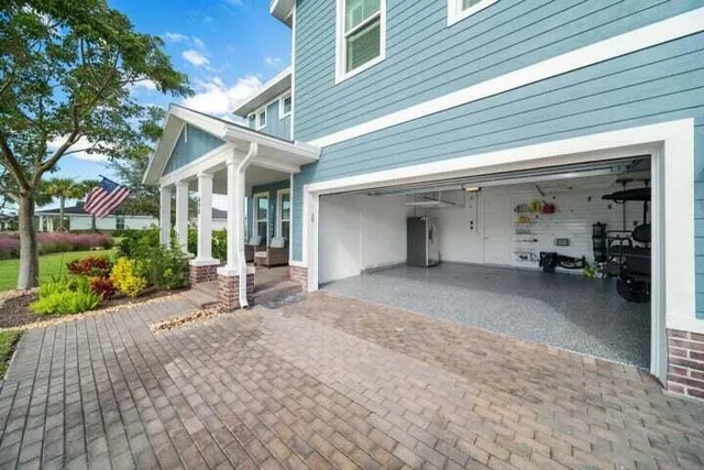 a view of parking garage with cars