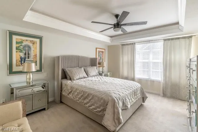 a bed room with a bed and furniture