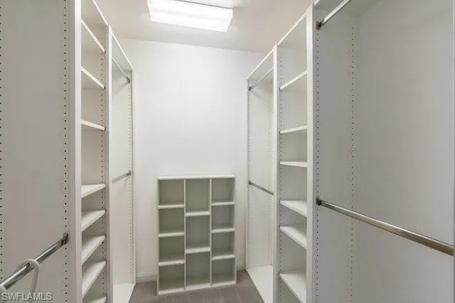 a view of an empty walk in closet