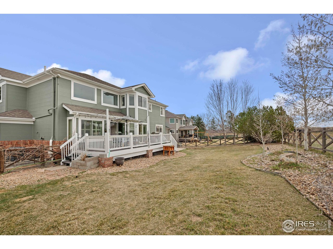 3058 West 111th Drive Westminster, CO 80031 - Photo 31 of 39 a view of a house with a yard