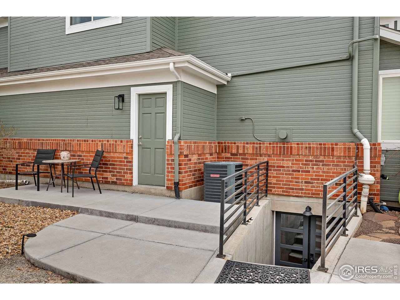 3058 West 111th Drive Westminster, CO 80031 - Photo 32 of 39 a backyard of a house with seating space