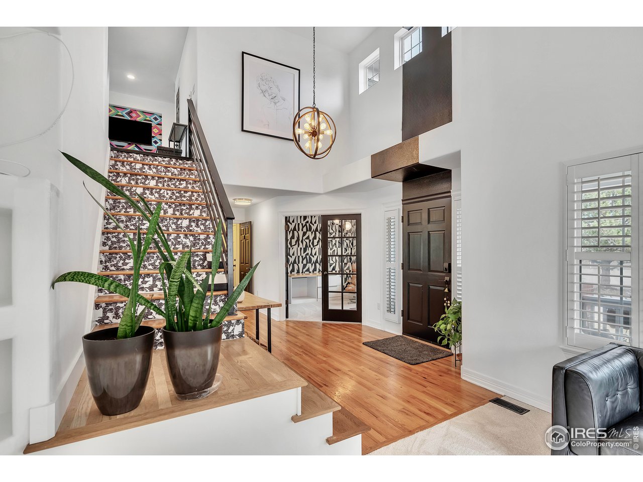3058 West 111th Drive Westminster, CO 80031 - Photo 5 of 39 a view of living room filled with furniture and window