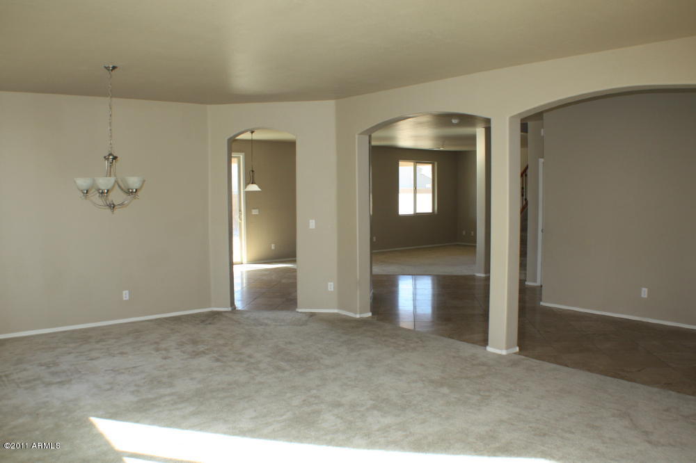 19368 North Lariat Road Maricopa, AZ 85138 - Photo 4 of 8 Formal Dining and living room