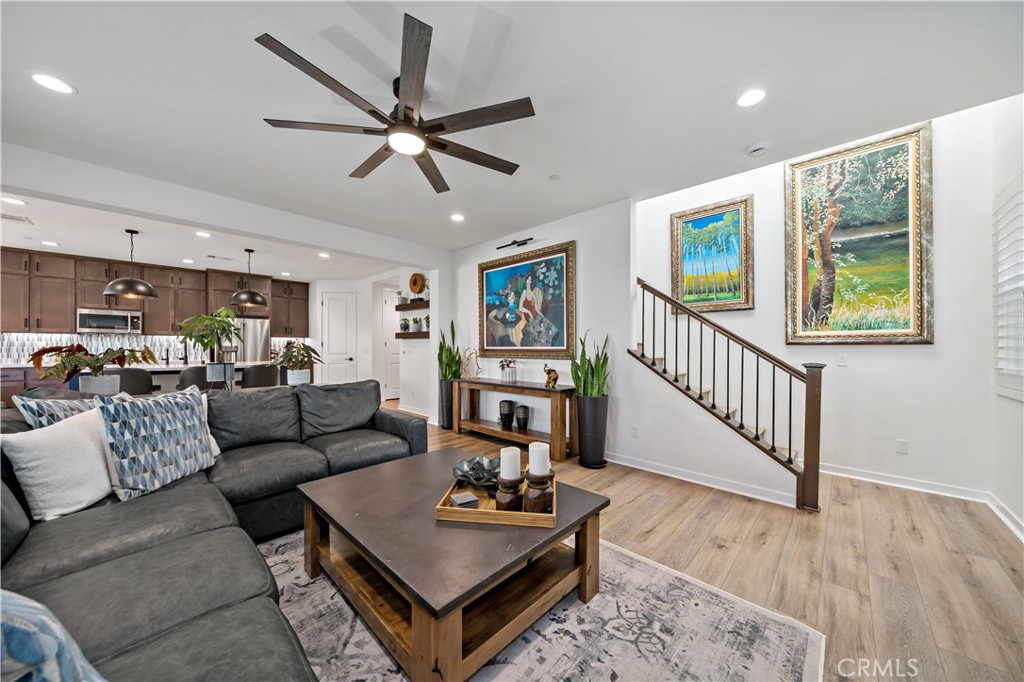32230 Penstemon Way Temecula, CA 92591 - Photo 14 of 61 Great room with custom stair rail