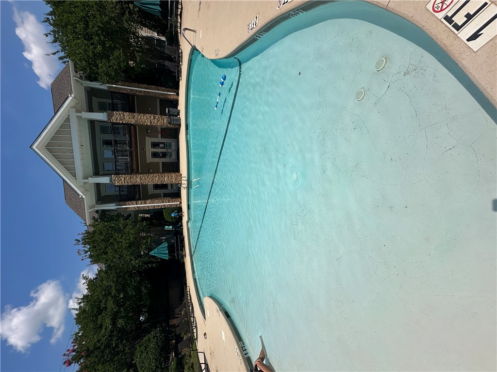131 Lookover Drive Anderson, SC 29621 - Photo 15 of 18 A sparkling pool offers refreshing dips against the backdrop of a welcoming community building.