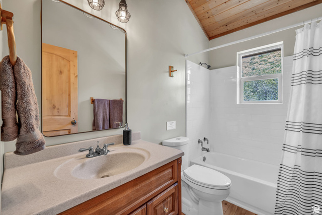 2348 North Miles Holw Road, Unit 26 Kamas, UT 84036 - Photo 21 of 31 Full bathroom with vanity, shower / bath combination with curtain, and wood ceiling