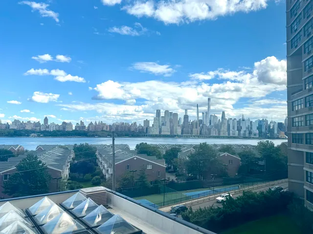 a view of a lake in middle of the house