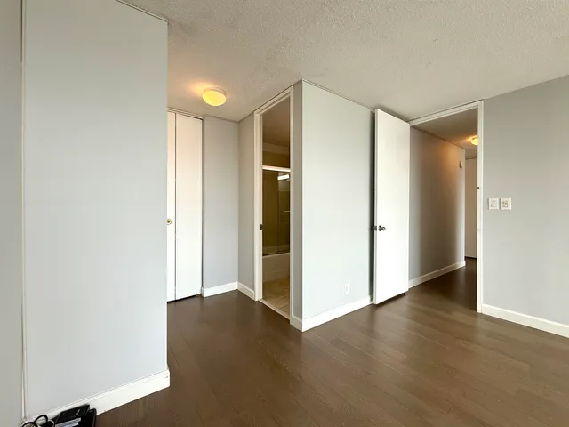a view of entryway with wooden floor